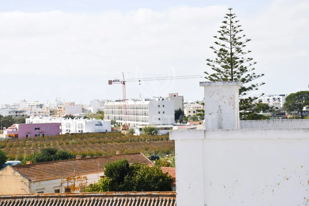 Moradia T4 para Venda em Quelfes Foto 40