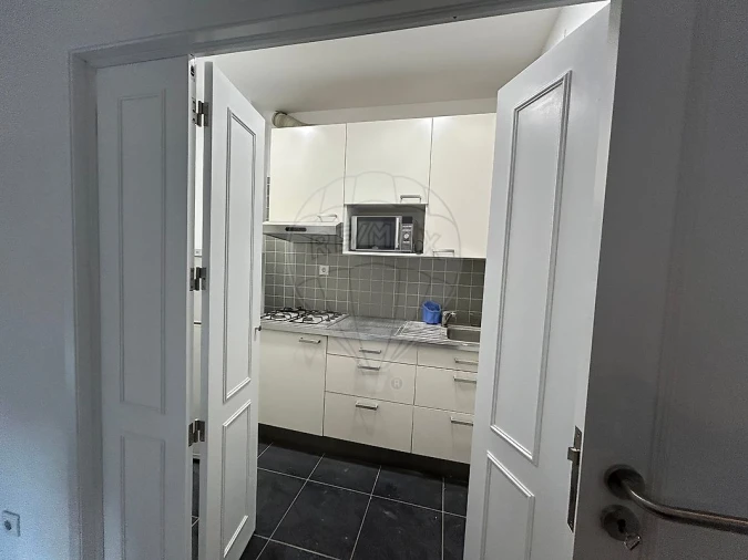 Apartamento T1 para Arrendamento em Santo Antonio dos Olivais Foto 1