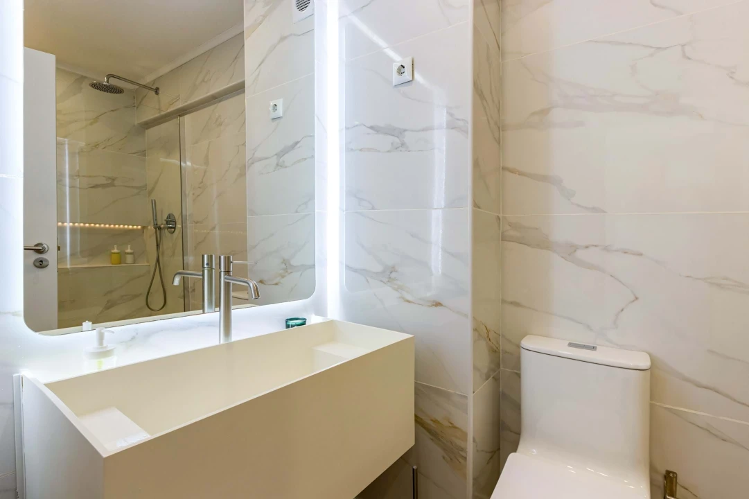 Apartamento T2 para Venda em Costa da Caparica Foto 24