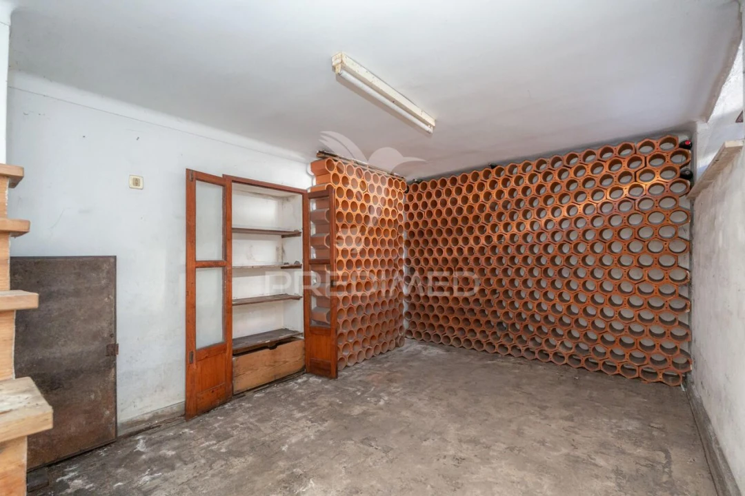 Moradia T5 para Venda em Santo Antonio dos Olivais Foto 31