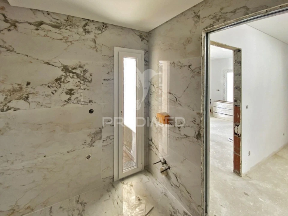 Moradia T4 para Venda em Corroios Foto 2