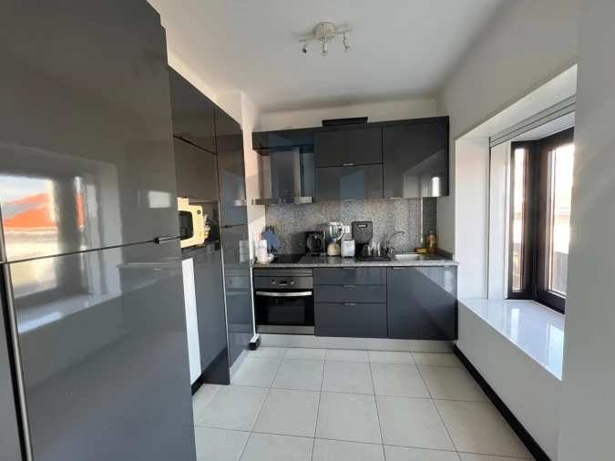 Apartamento T1 para Arrendamento em Santo Antonio dos Olivais Foto 5