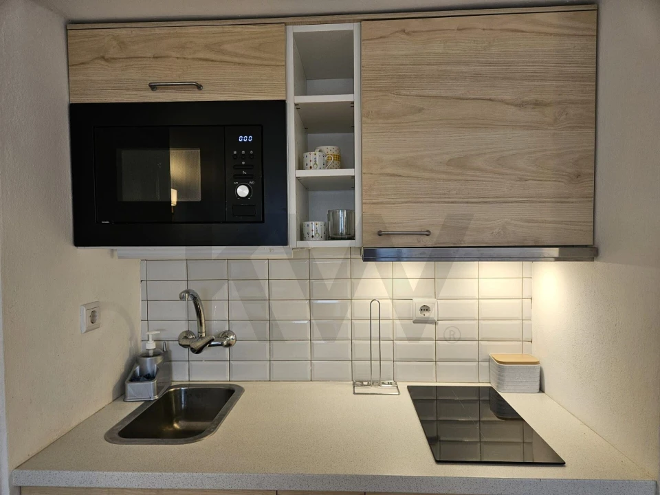 Apartamento T1 para Arrendamento em Santo Antonio dos Olivais Foto 7