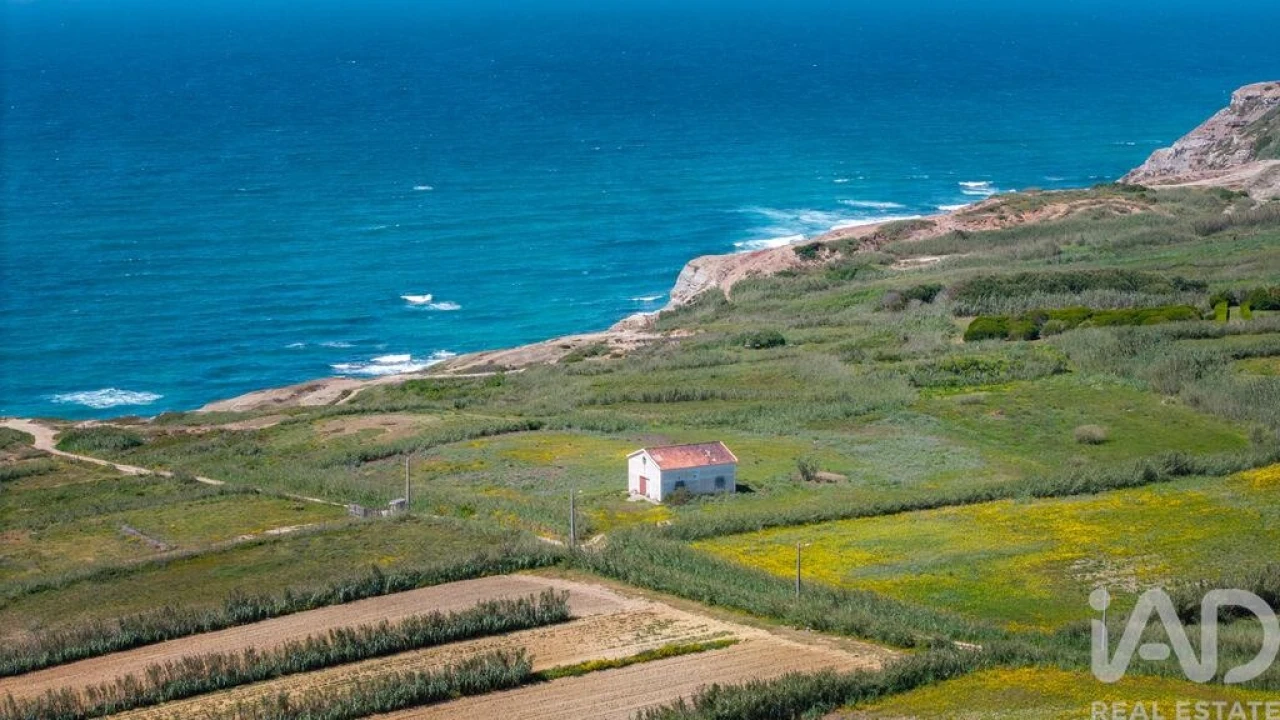Terreno para Venda em Encosta do Sol Foto 1