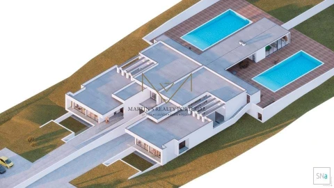Moradia T4 para Venda em Charneca de Caparica e Sobreda
